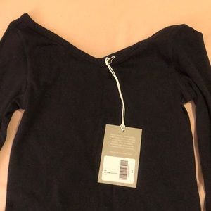 BRAND NEW WITH TAG. Long sleeve ribbed shirt